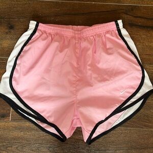I’m selling these very cute pink Nike shorts! Only worn 2 times.